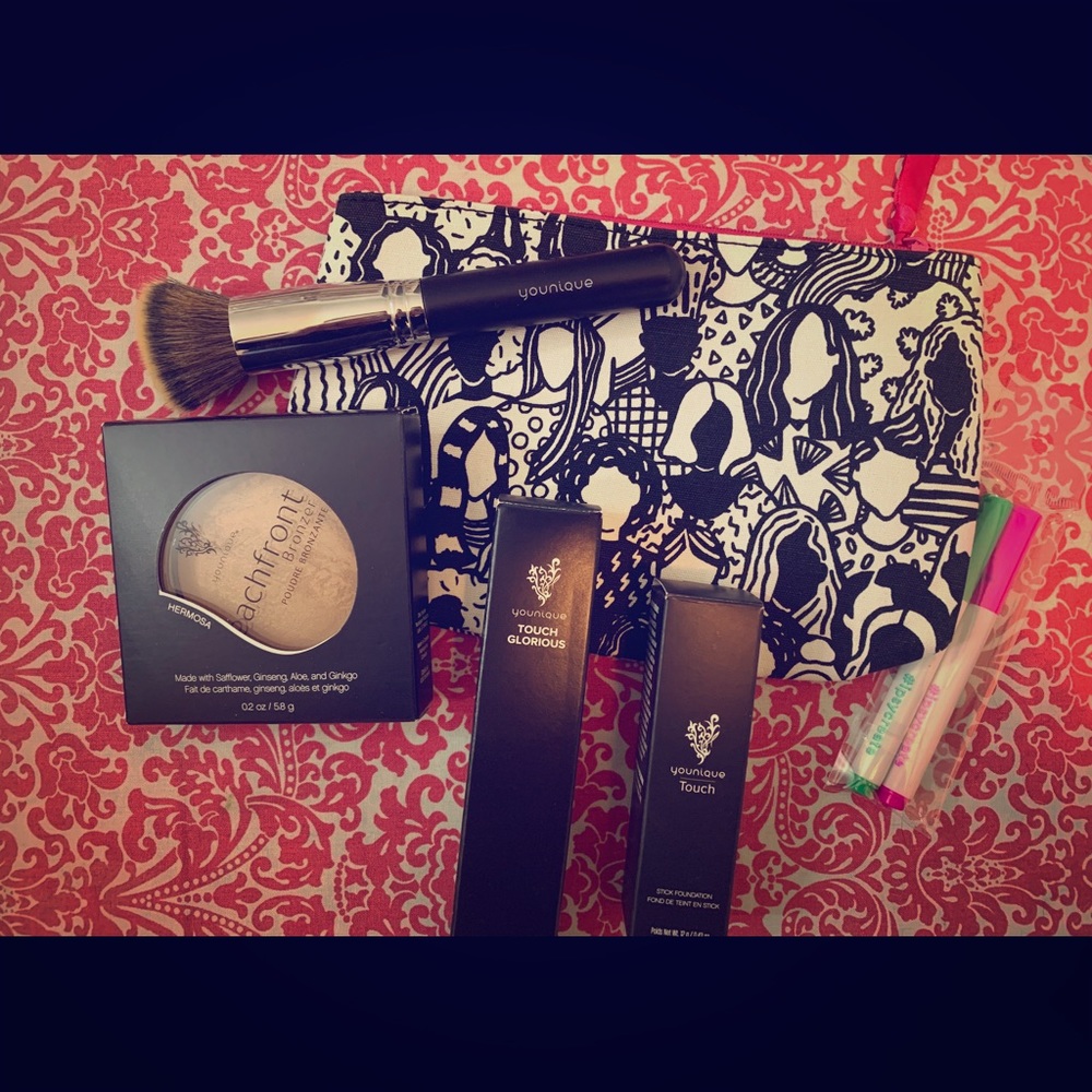 Younique set with cute makeup bag